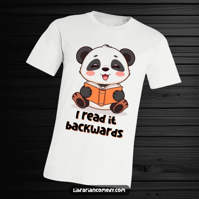 Funny giggling panda reading a book upside down on a t-shirt, showing quirky reading style, a funny gift.